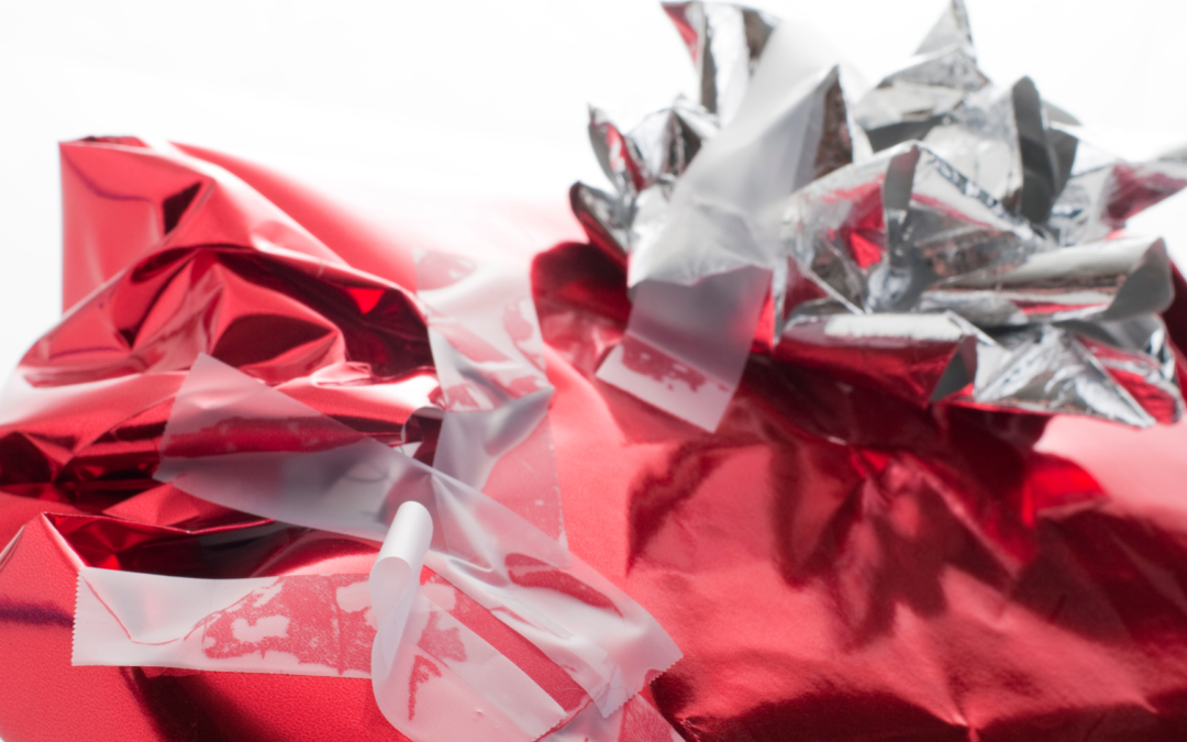 Red gift wrap with silver box and taps